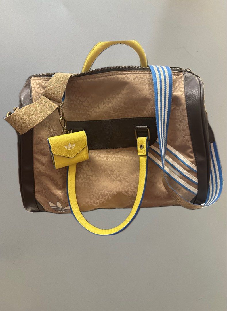 adidas Originals 'adicolor 70s' unisex monogram duffle bag in brown
