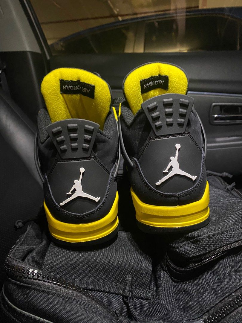 Air Jordan 4 Thunder Men s Fashion Footwear Sneakers on Carousell