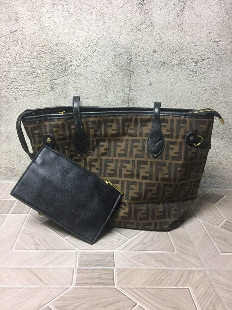 Fendi Handbag (Category: Luxury Bags & Wallets) located in Catbalogan. Submitted by paige.808 (Listing ID 1253449266, Image 2). Description: No idea if legit or not Slightly nego 16.5 by 10 No issue, needs light cleaning only.