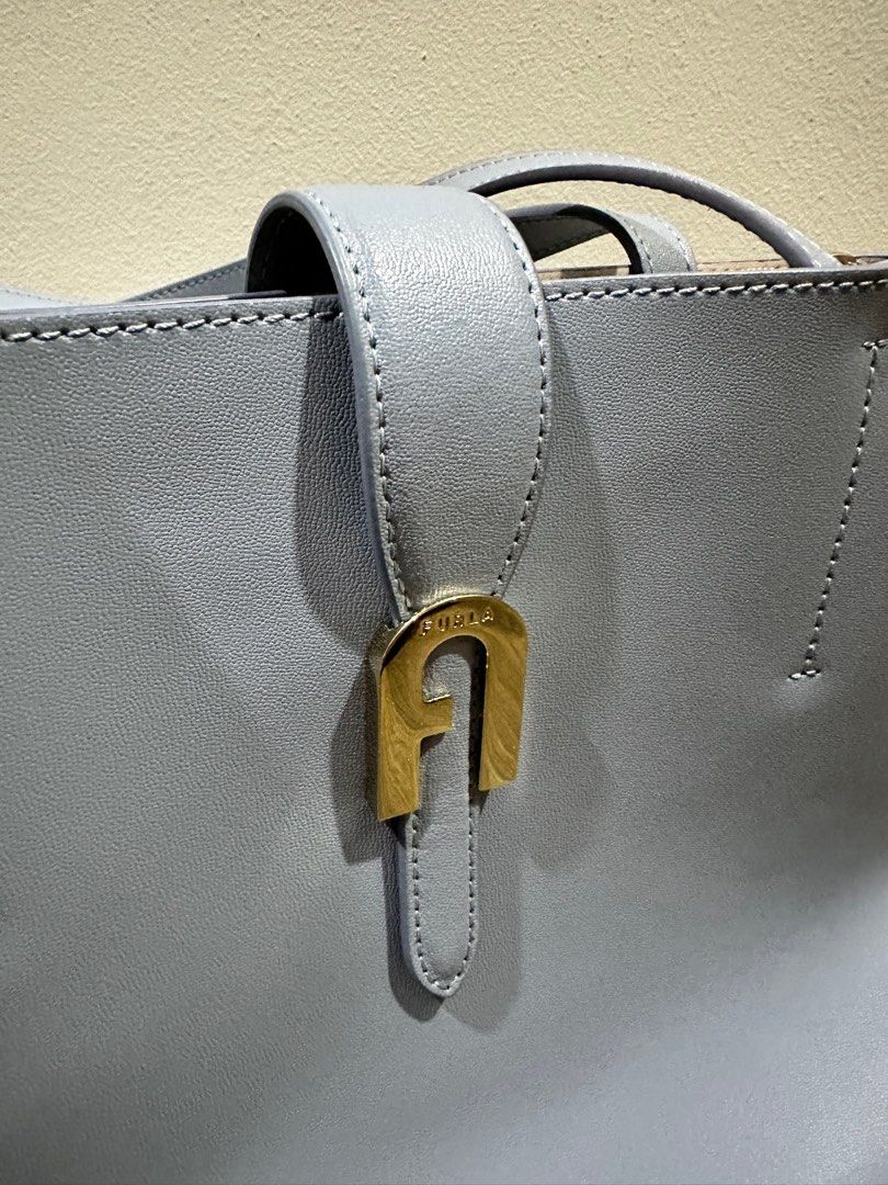 Genuine Furla leather bag in light blue