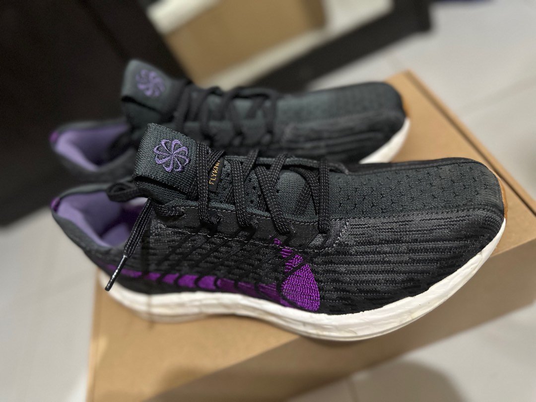 Purple nike running best sale shoes