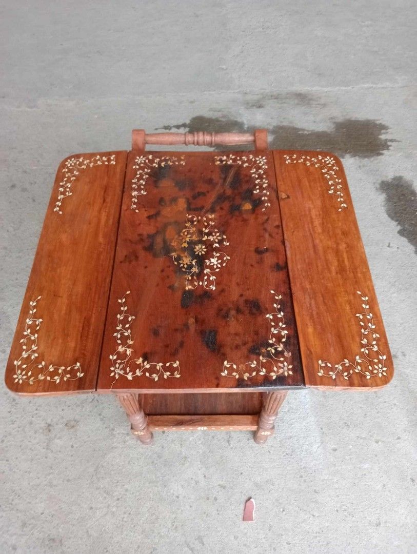 Old Trolley / Foodcart (Category: Other Home Furniture) located in Paranaque City. Submitted by mommykiee (Listing ID 1253412527, Image 3). Description: Old trolley / foodcart Made of narra wood w/ bone inlay Size: When open: L32 W32 H25inch. Closed: L32 W18 H25inch Newly stripped & varnished Ready to use.
