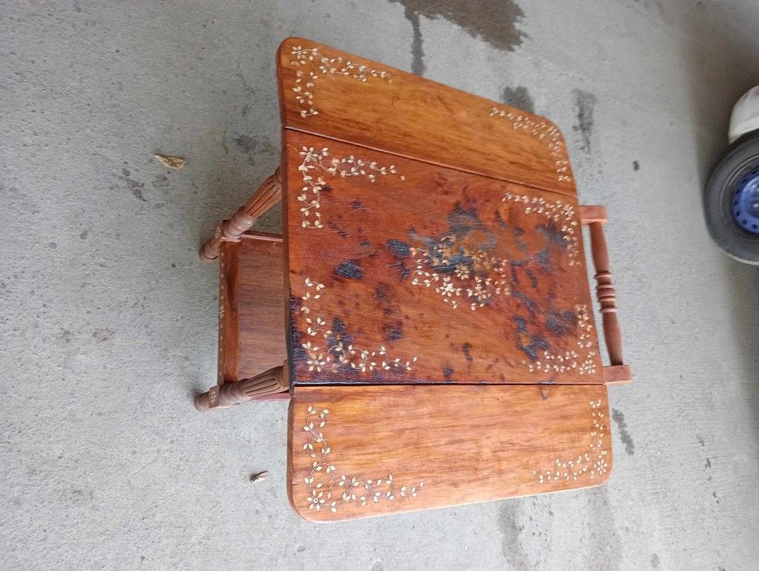Old Trolley / Foodcart (Category: Other Home Furniture) located in Paranaque City. Submitted by mommykiee (Listing ID 1253412527, Image 1). Description: Old trolley / foodcart Made of narra wood w/ bone inlay Size: When open: L32 W32 H25inch. Closed: L32 W18 H25inch Newly stripped & varnished Ready to use.