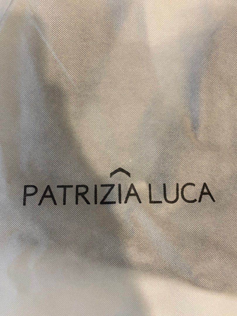 Patrizia luca triangle best sale geometric faux leather backpack