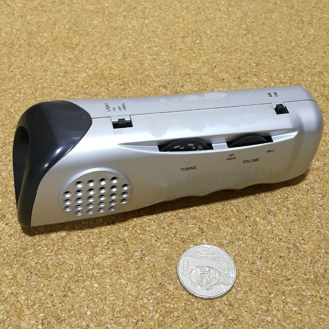 Portable Radio tested working READ (Category: Portable Audio Accessories) located in Paranaque City. Submitted by Arby.Collectibles (Listing ID 1253414094, Image 1). Description: Working handy radio. Am works fine and sounds great. FM is japanese range so hanggang 92Mhz lang. Siren is working and loud. Flash Light not working and may need a replacement bulb, madali lang palitan. Gcash MOP and Rider. Sold as is where is..