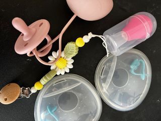 Take all for 400: breastmilk collector pacifier and pacifier holder
