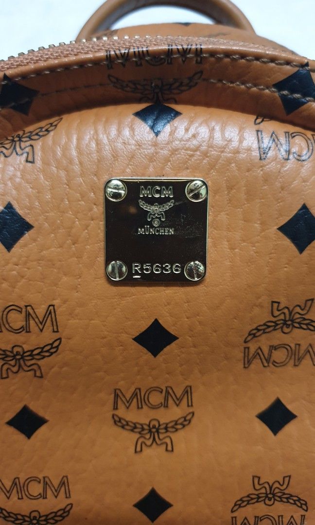 Mcm bag original vs fake cheap