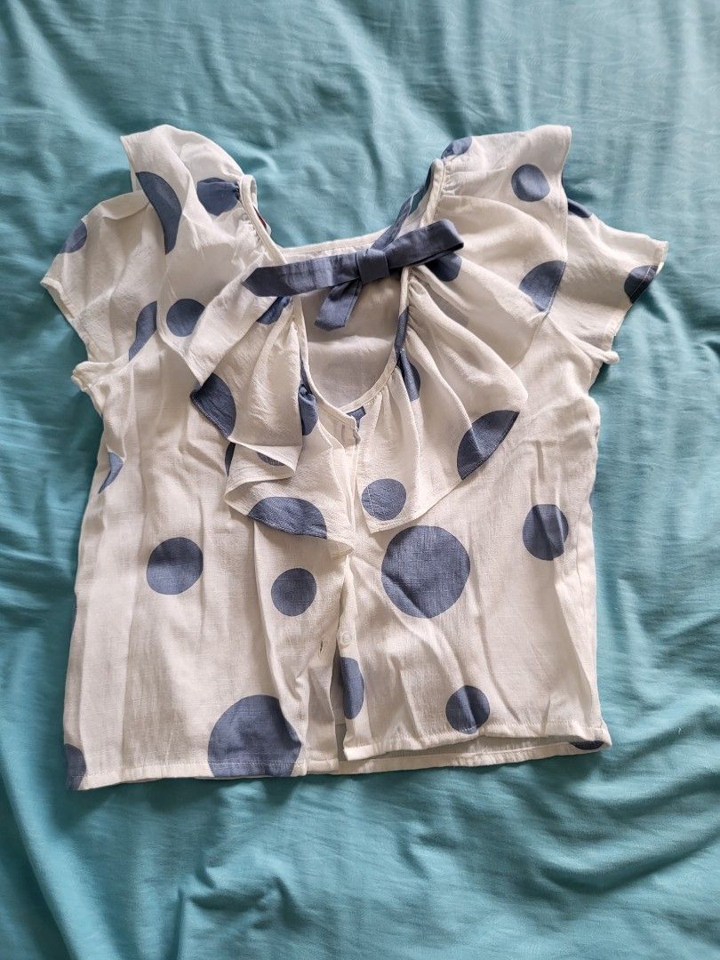 White blouse with 2024 blue polka dots