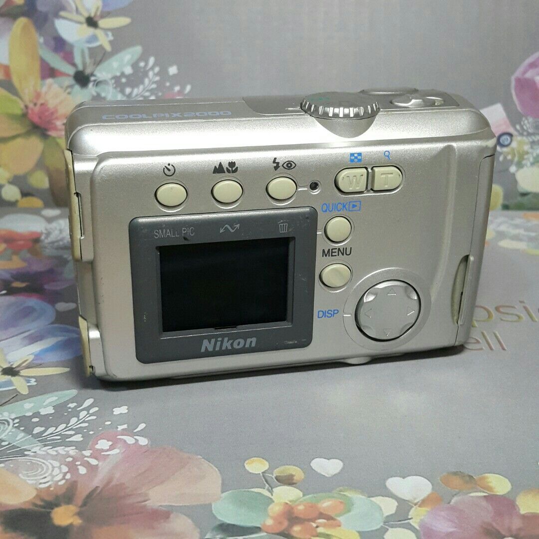 Coolpix 2000 CCD Vintage Vibes Digicam (Category: Cameras) located in Paranaque City. Submitted by vintagepopsicle (Listing ID 1253691182, Image 2). Description: Achieve the look of Old Vintage Vibes photos with this legendary Coolpix 2000 Digicam. ♡ Camera can take photo and video ♡ Photos have a pop or 3D look ♡ Tested including a working flash ♡ Excellent Macro capabilities ♡ The lens cover does not fully close when you turn off because of its