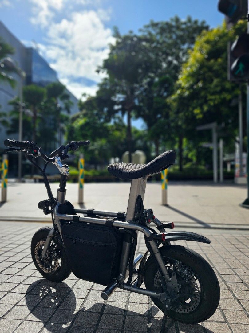 Fiido Q1 - Raygun metal ebike (Category: Bicycles) located in Manila. Submitted by sandrooo (Listing ID 1253577090, Image 3). Description: Fiido Q1 Raygun Metal 72v 5000w motor single hub 50a YYK Controller with Bluetooth MT7 Pro Magura Brakers Magura 203mm mdrp rotors Custom steering damper mount Matris steering damper Carbon mudguard Pizza seat Powder Coat - Metallic Grey Color Stainless Foot peg Wired Sleeves Mini driving light V6 (including s