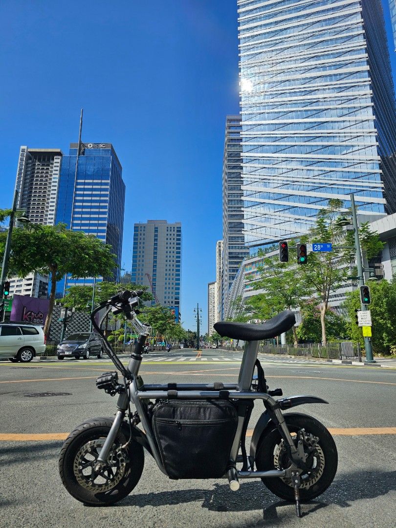 Fiido Q1 - Raygun metal ebike (Category: Bicycles) located in Manila. Submitted by sandrooo (Listing ID 1253577090, Image 1). Description: Fiido Q1 Raygun Metal 72v 5000w motor single hub 50a YYK Controller with Bluetooth MT7 Pro Magura Brakers Magura 203mm mdrp rotors Custom steering damper mount Matris steering damper Carbon mudguard Pizza seat Powder Coat - Metallic Grey Color Stainless Foot peg Wired Sleeves Mini driving light V6 (including s