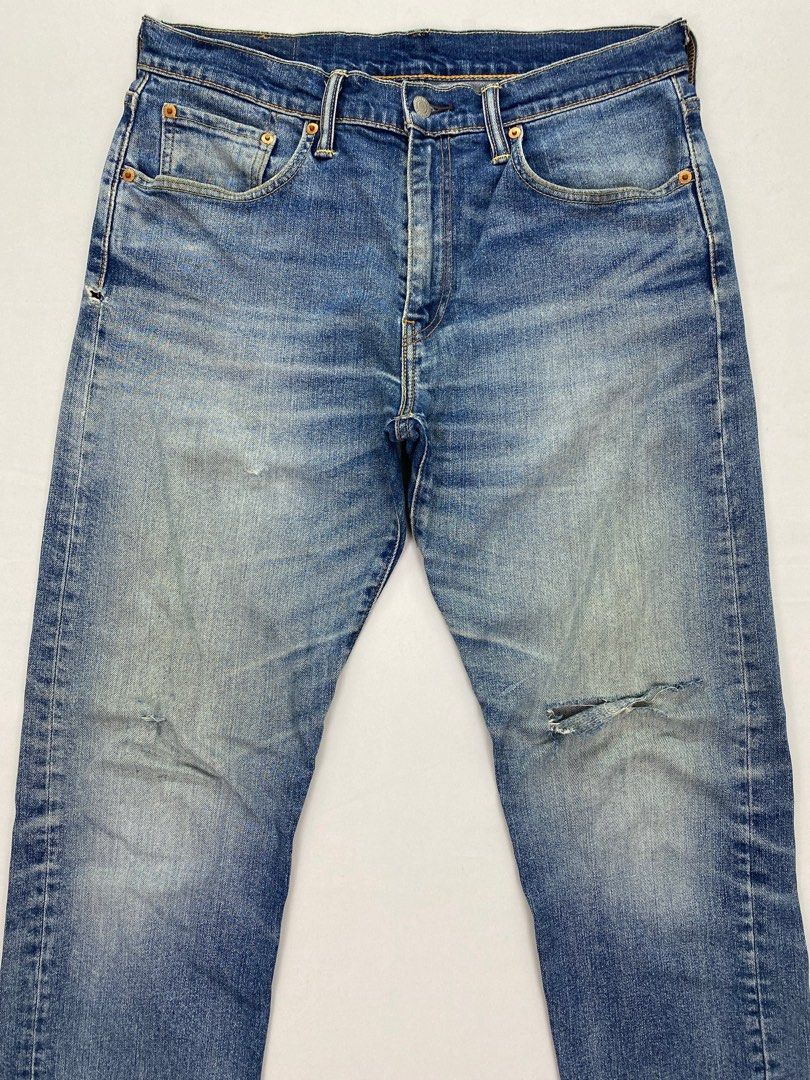 Levi's 502 discount ripped jeans