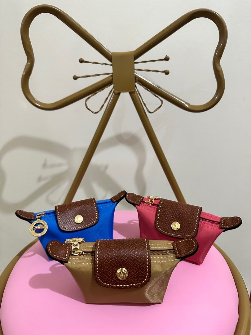 Longchamp coin purse (Category: Luxury Bags & Wallets) located in Taguig. Submitted by lux.mariah (Listing ID 1253673083, Image 2). Description: with dustbag mini coin purse all colors available same day delivery or j&t.