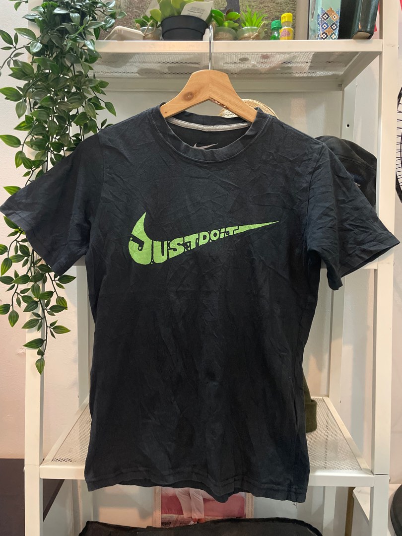 Black nike shirt shop with green swoosh
