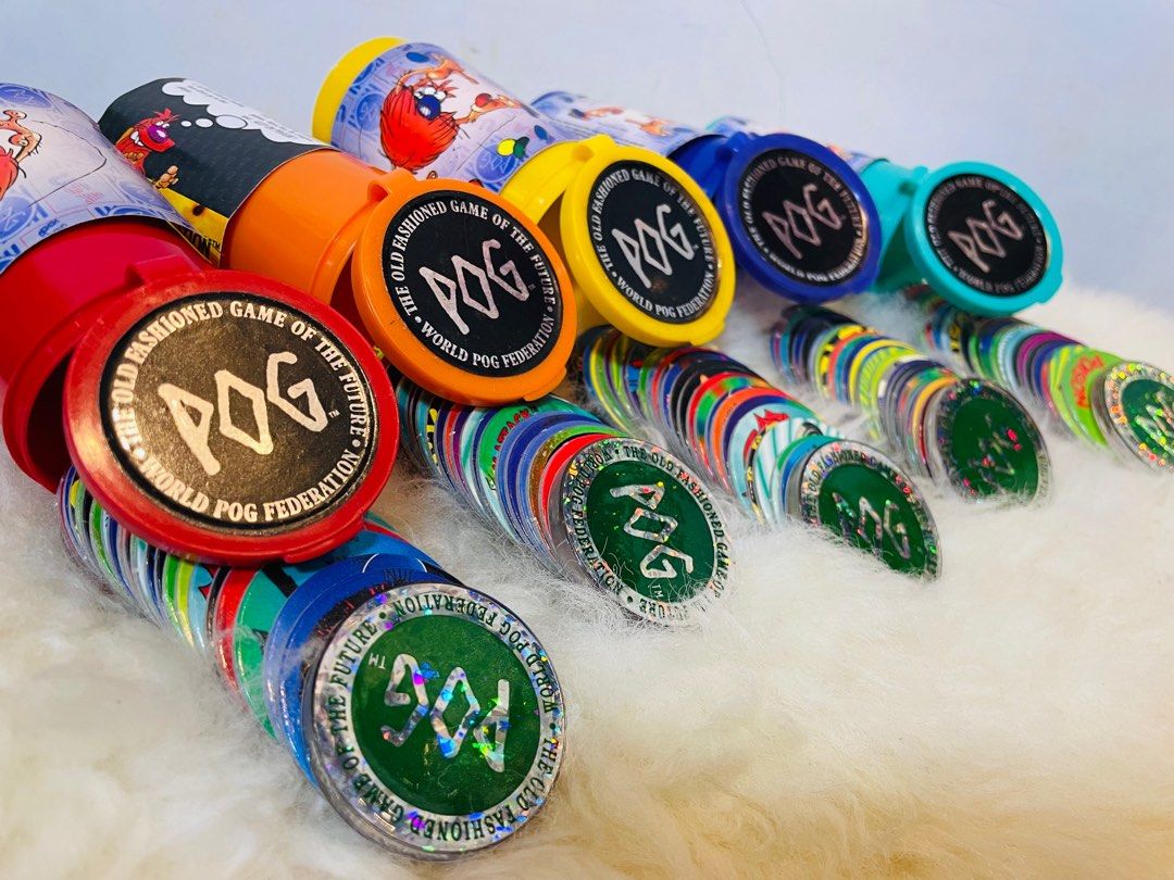 Pogs original complete set (Category: Vintage Collectibles) located in Makati City. Submitted by tomypom (Listing ID 1253543861, Image 3). Description: Authentic Pogs USA set sale! Pog usa complete sealed 5 different colors 75pcs + 5 slammers Classic 90’s! If per canister 299 pesos each! 1399 only per set of 5!!!.