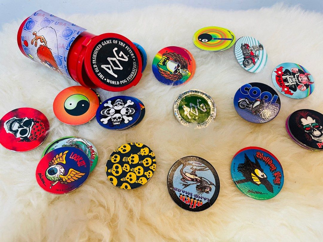 Pogs USA original sealed (Category: Vintage Collectibles) located in Makati City. Submitted by tomypom (Listing ID 1253545571, Image 1). Description: Authentic Pogs USA sealed Classic 90’s 25 pcs pogs + 1 slammer! 299 pesos only per canister! If complete set 1,499 pesos! Brand new sealed! .