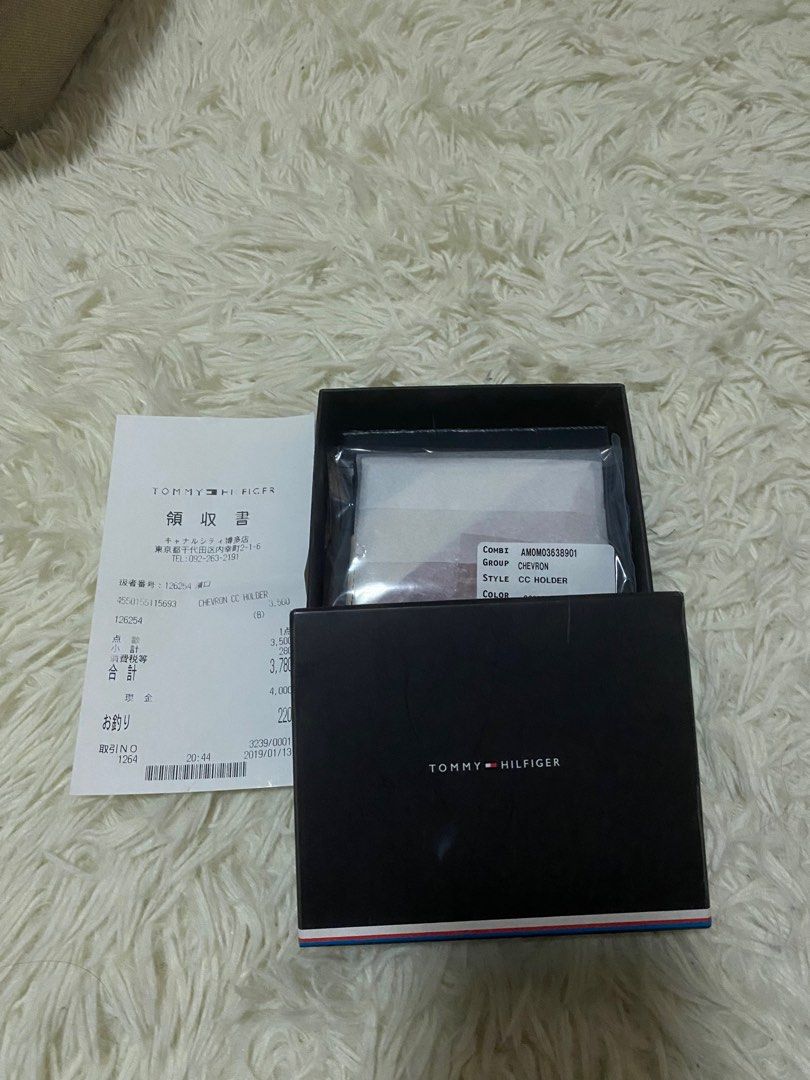 Tommy Hilfiger Card Holder / Wallet (Category: Wallets & Card Holders) located in Quezon City. Submitted by ianfab (Listing ID 1253648792, Image 2). Description: Selling my Tommy Hilfiger card holder Condition: 7/10, needs cleaning and has a small scratch at the back as seen in the picture. Still very much usable. It’s complete with original box and card as well as official receipt from Tommy Hilfiger. I bought this at a Tommy Hilfiger branch in 