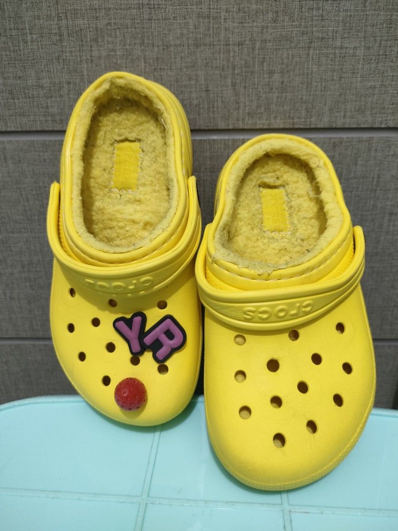 Yellow crocs with fur inside shop