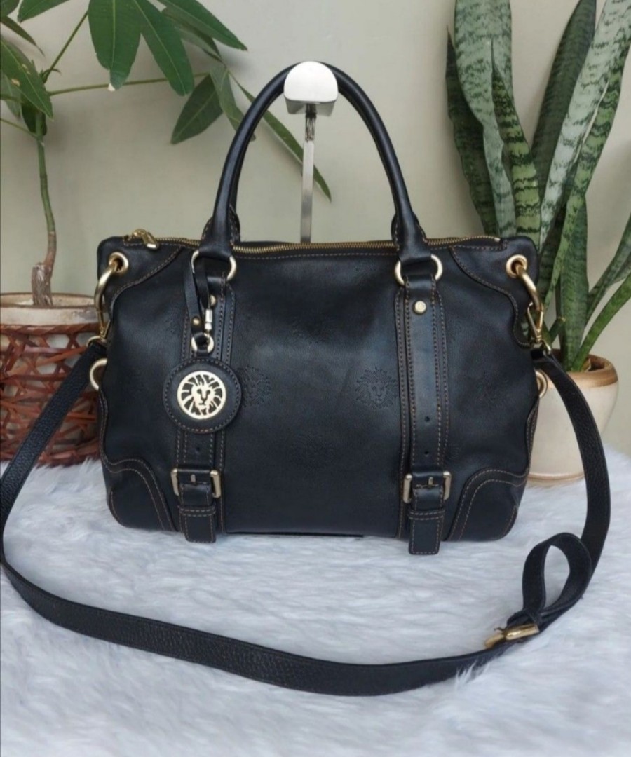 Small Black Leather Bag with Lion's Face