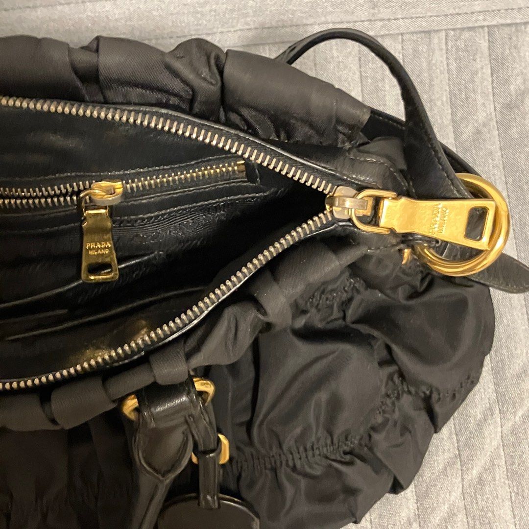 Authentic hotsell prada zipper