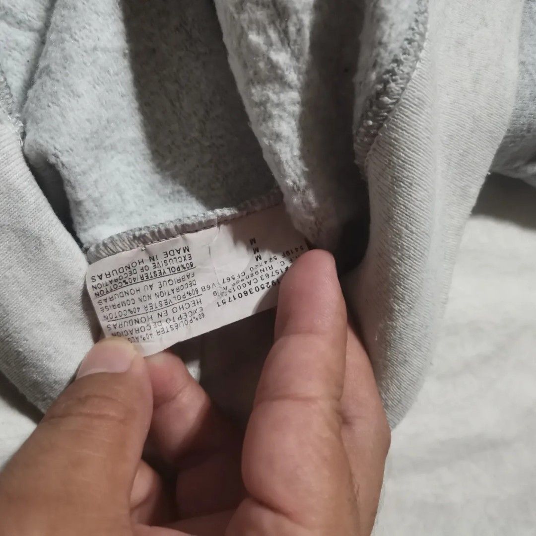 Champion sweater deals tag 60