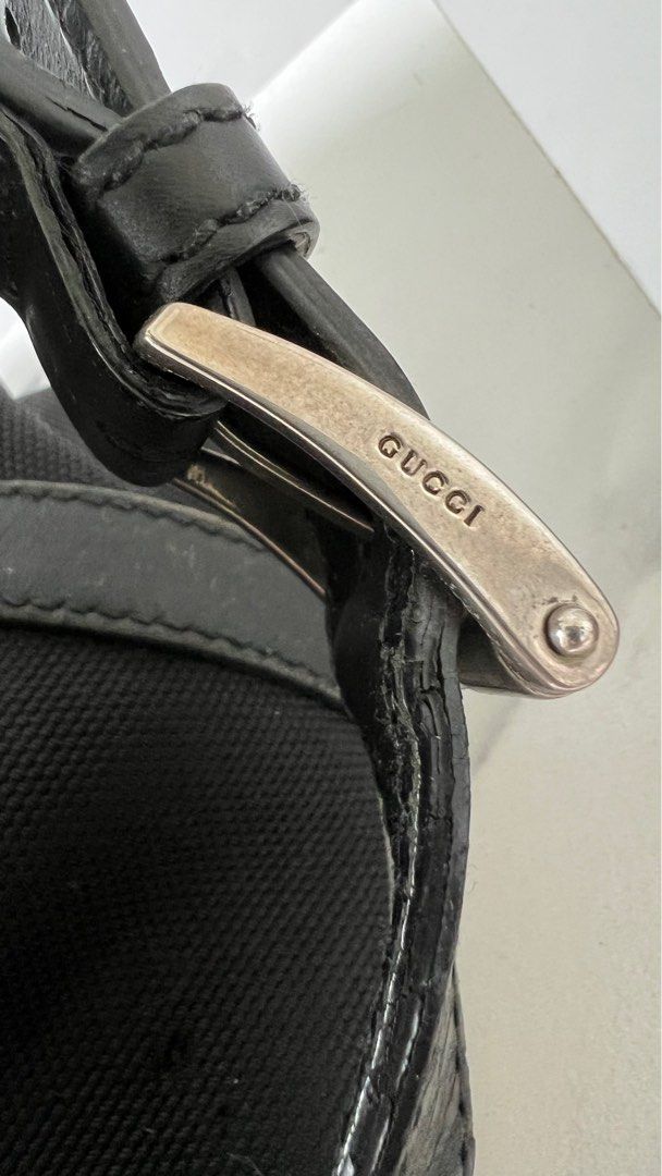 Gucci black on sale handbag with stripe