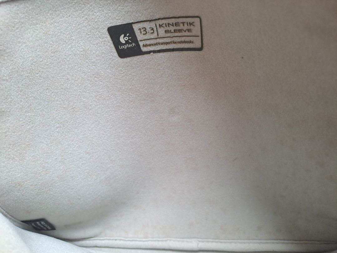Logitech laptop sleeve case 12, 13, 13.3 inch (Category: Laptop Bags & Sleeves) located in Quezon City. Submitted by ph_araoh (Listing ID 1253769601, Image 3). Description: Authentic Logitech laptop sleeve Black with 2 secondary pockets fits maximum 13.3 inches laptop and smaller issues: normal tarnishing of metal zippers (still working).