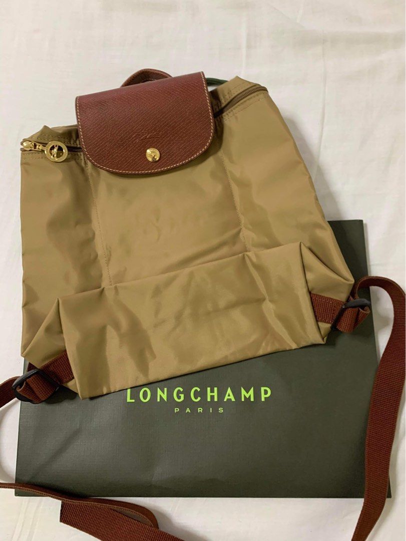 Preloved Longchamp Le Pliage Backpack (Category: Luxury Bags & Wallets) located in Manila. Submitted by mysticwater.4605ca (Listing ID 1253861416, Image 1). Description: Used less than 5 times only 100% authentic From London🇬🇧 (Pasabuy) Retail Price: 9,800 (Rustans) .