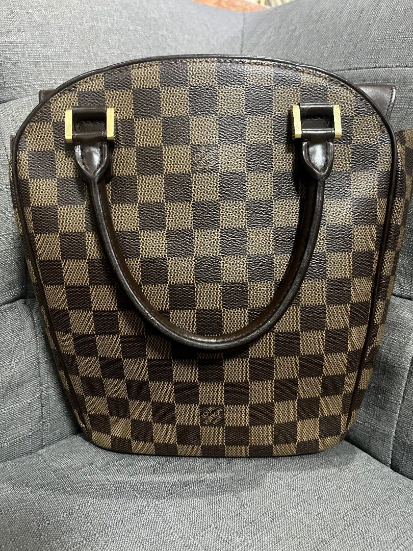LV damier ebene handbag (Category: Luxury Bags & Wallets) located in Antipolo. Submitted by msshop26 (Listing ID 1253819518, Image 3). Description: LV Sarria Seàu damier ebene handbag it's a very classy structured handbag but can still put a sling if u want 9/10 condition with entrupy.