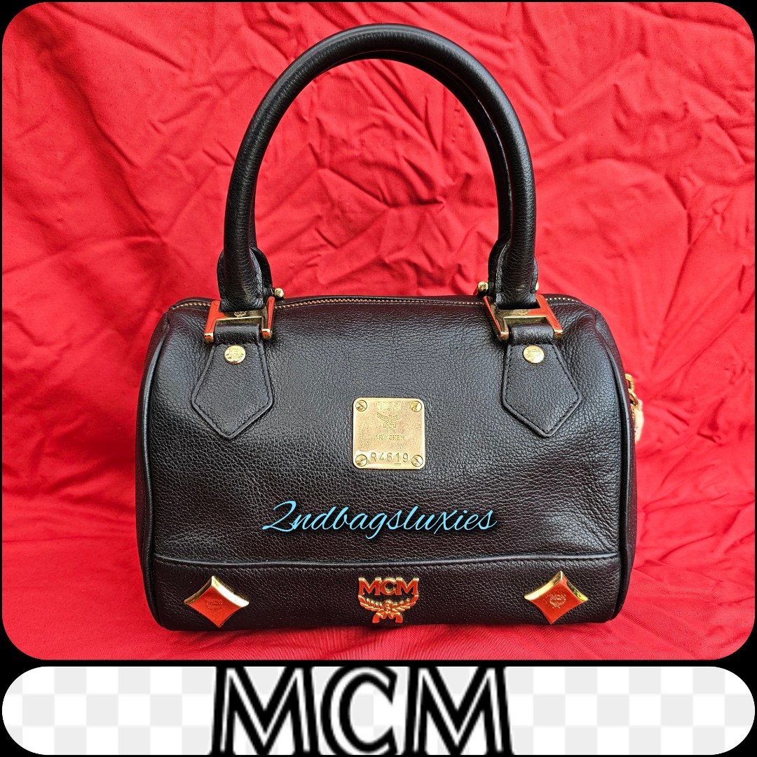 MCM papillon black, Luxury, Bags & Wallets on Carousell