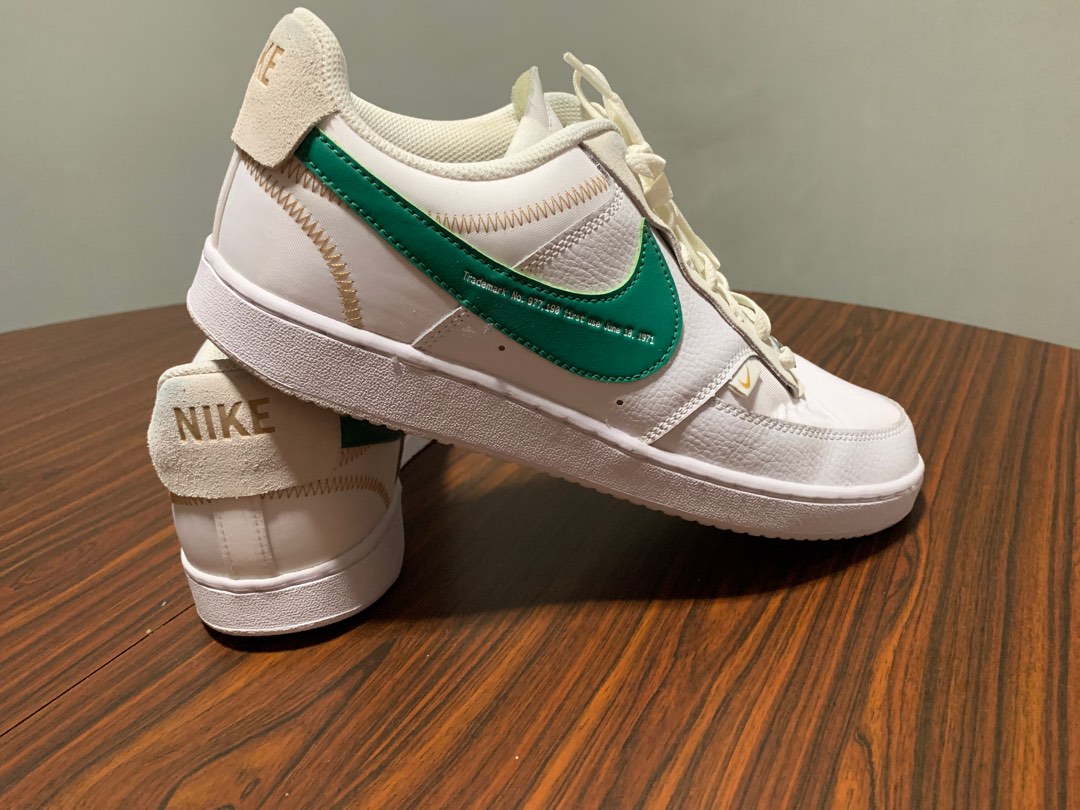 White nike shoes with green swoosh best sale