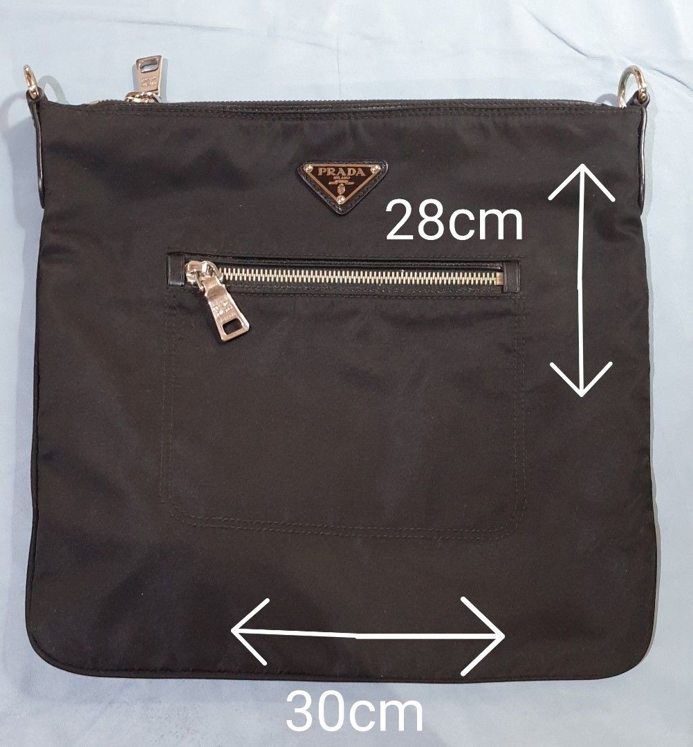 PRADA Sling Crossbody Bag BT0715 (Category: Luxury Bags & Wallets) located in Quezon City. Submitted by ilovenystuff (Listing ID 1253744516, Image 3). Description: Original Prada Sling Crossbody Bag BT0715 Tessuto Nylon Color Black dimension: 30 x 28cm adjustable sling strap ☆ Stocked only did not use still with tag very good condition.