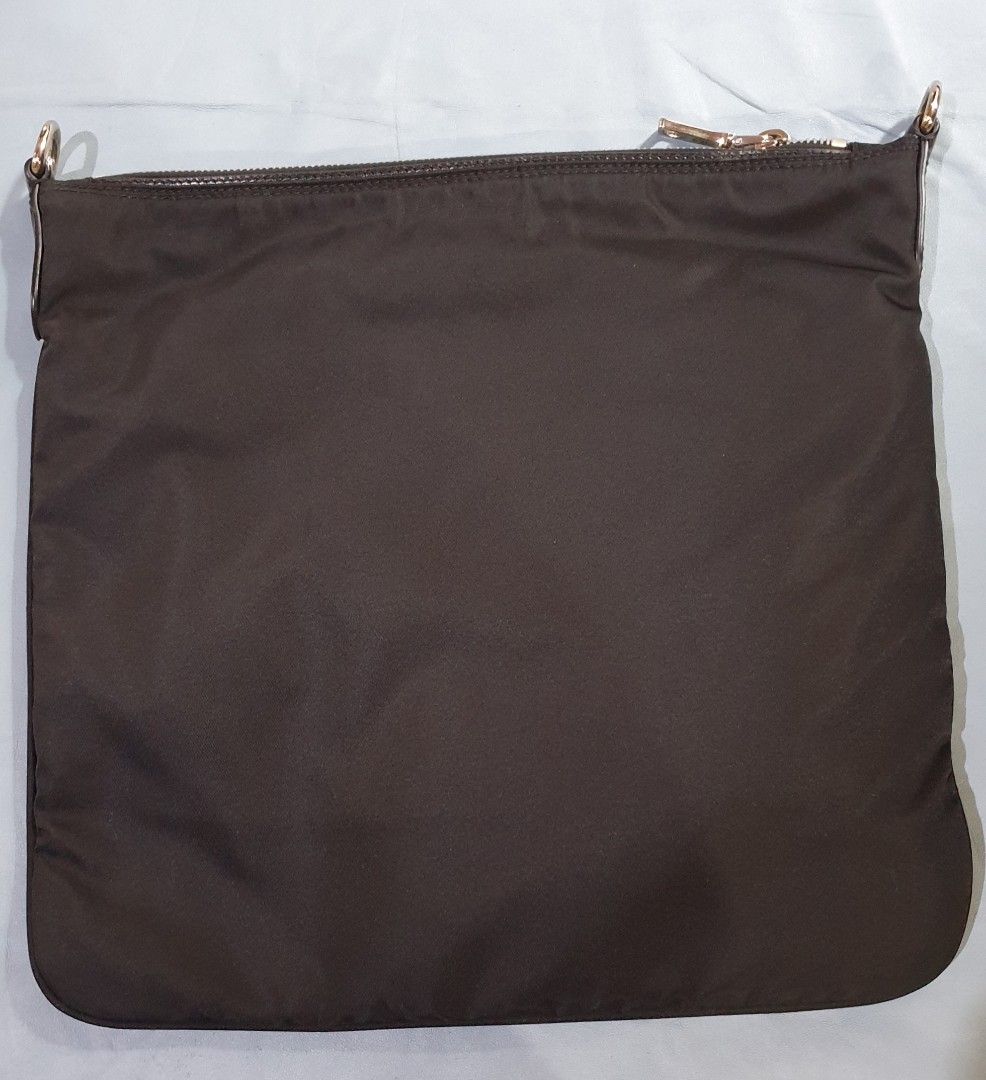 PRADA Sling Crossbody Bag BT0715 (Category: Luxury Bags & Wallets) located in Quezon City. Submitted by ilovenystuff (Listing ID 1253744516, Image 2). Description: Original Prada Sling Crossbody Bag BT0715 Tessuto Nylon Color Black dimension: 30 x 28cm adjustable sling strap ☆ Stocked only did not use still with tag very good condition.
