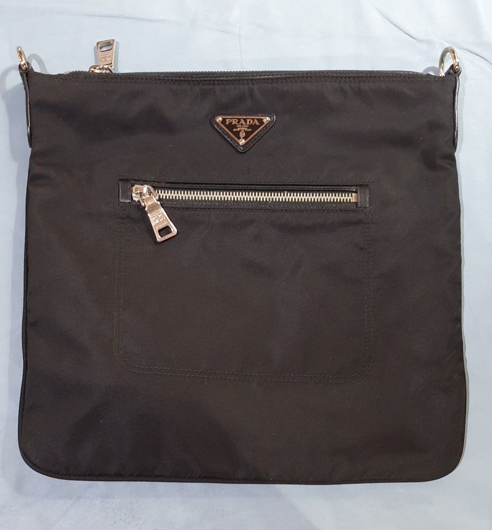 PRADA Sling Crossbody Bag BT0715 (Category: Luxury Bags & Wallets) located in Quezon City. Submitted by ilovenystuff (Listing ID 1253744516, Image 1). Description: Original Prada Sling Crossbody Bag BT0715 Tessuto Nylon Color Black dimension: 30 x 28cm adjustable sling strap ☆ Stocked only did not use still with tag very good condition.