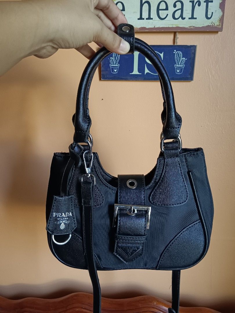 PRADA SMALL HANDBAG (Category: Luxury Bags & Wallets) located in Zamboanga. Submitted by bags2bags2bags (Listing ID 1253704586, Image 1). Description: Prada small handbag good condition pm.
