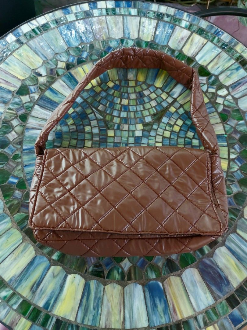 Chocolate Brown Quilted Pillow Bag (Category: Shoulder Bags) located in Makati City. Submitted by drawerph (Listing ID 1253717269, Image 1). Description: Brown Pillow Bag Nylon No issues.