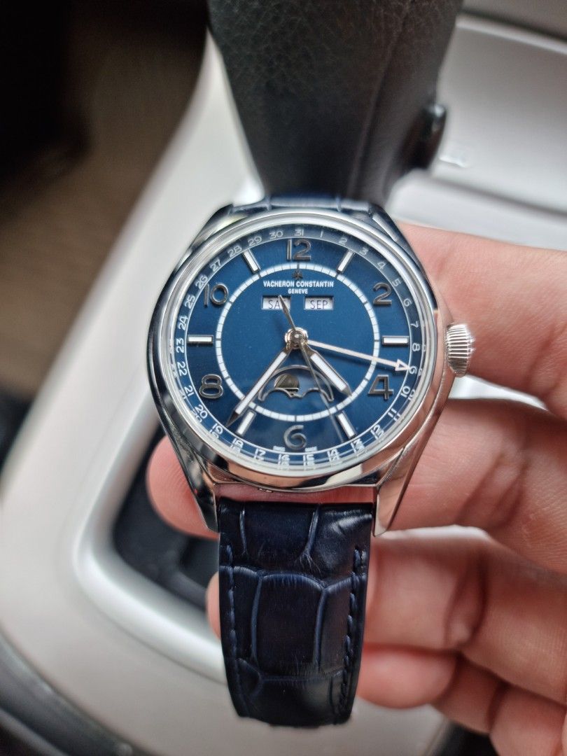 [Rare] Vacheron Constantin FiftySix Complete Calendar 4000E/000A-B548 (Category: Watches) located in Singapore. Submitted by towall12 (Listing ID 1253800776, Image 2). Description: Hi all, letting go my VC FiftySix complete calendar dated late 2021. Retailing at near 40k now, with waiting list, with the more sought after blue dial as well. Warranty till late 2029. Condition: Sent to VC boutique in ION Ochard for extensive movement checks during m