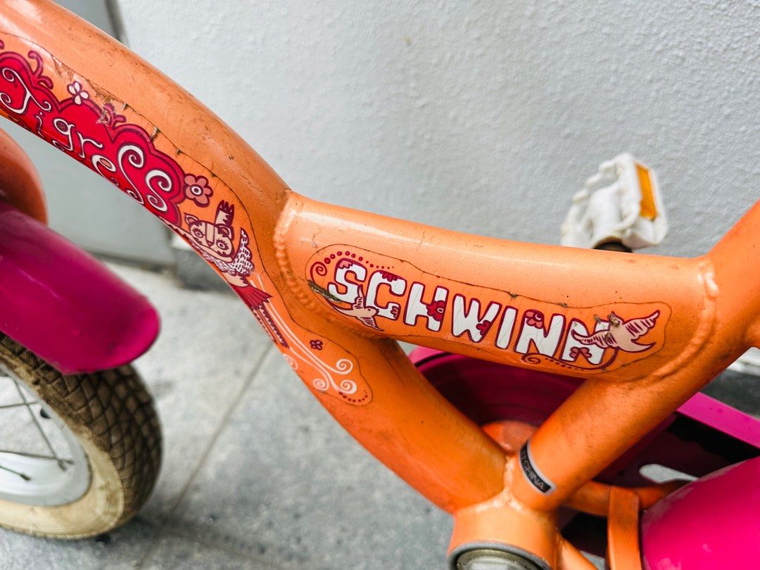 Girls best sale orange bike
