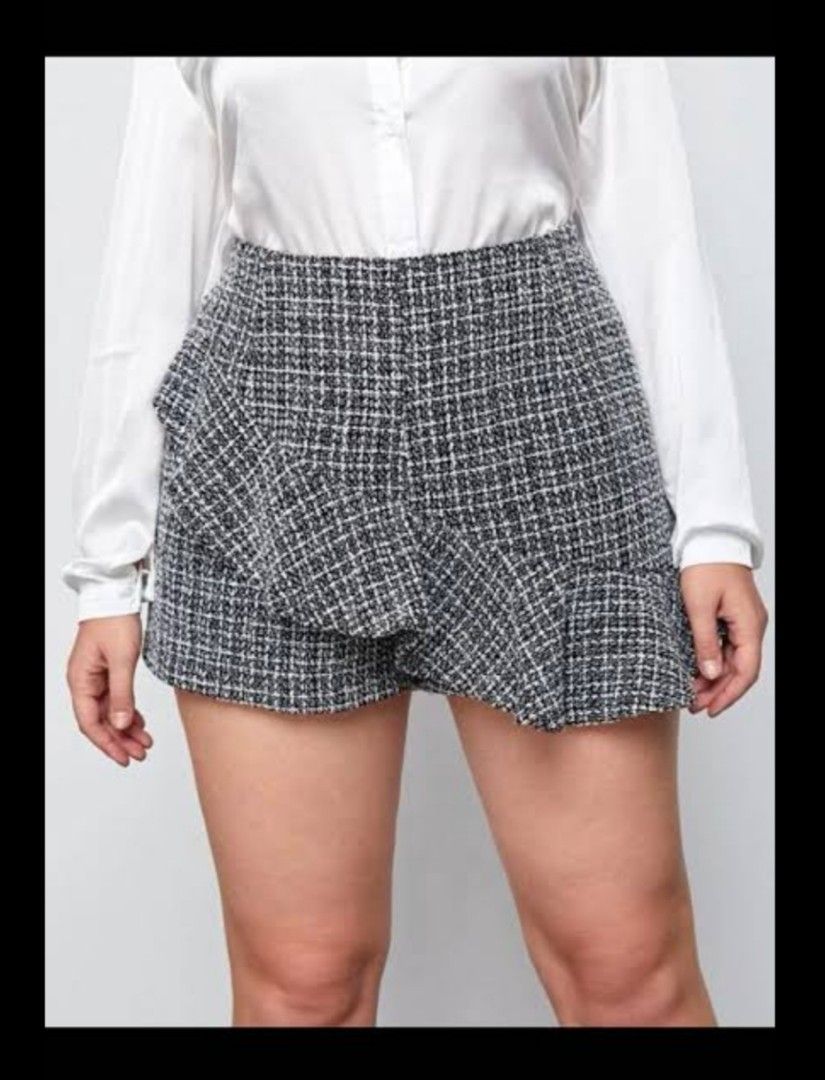 Tweed Plaid Skort (Category: Other Bottoms) located in Cebu City. Submitted by declutter_cebu (Listing ID 1253845521, Image 1). Description: Tweed Plaid Skort Korean Brand Used 2x No damages Garterized and with zipper on the side Thick and good quality tweed Some photos for reference only. RFS: declutter No Haggling Please!.