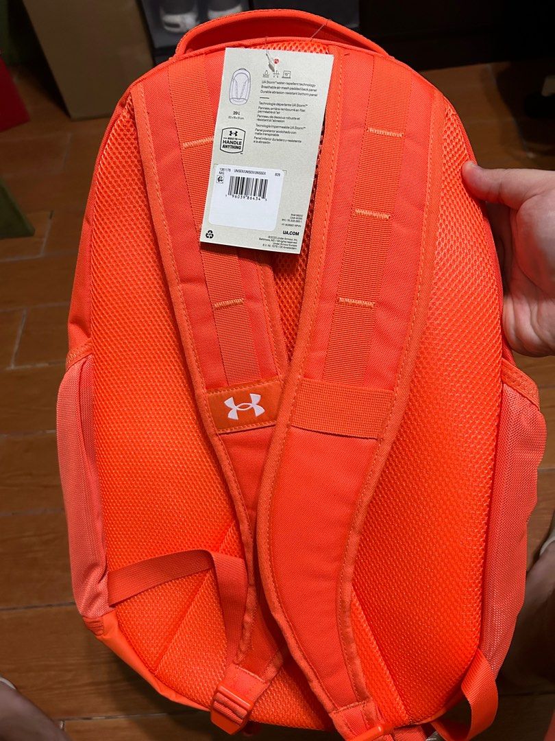 Under Armour Hustle 5.0 Storm Backpack (Category: Backpacks) located in Manila. Submitted by dancco (Listing ID 1253848377, Image 3). Description: never used, still with tags orange color Storm water resistant technology with shoe/laundry compartment.