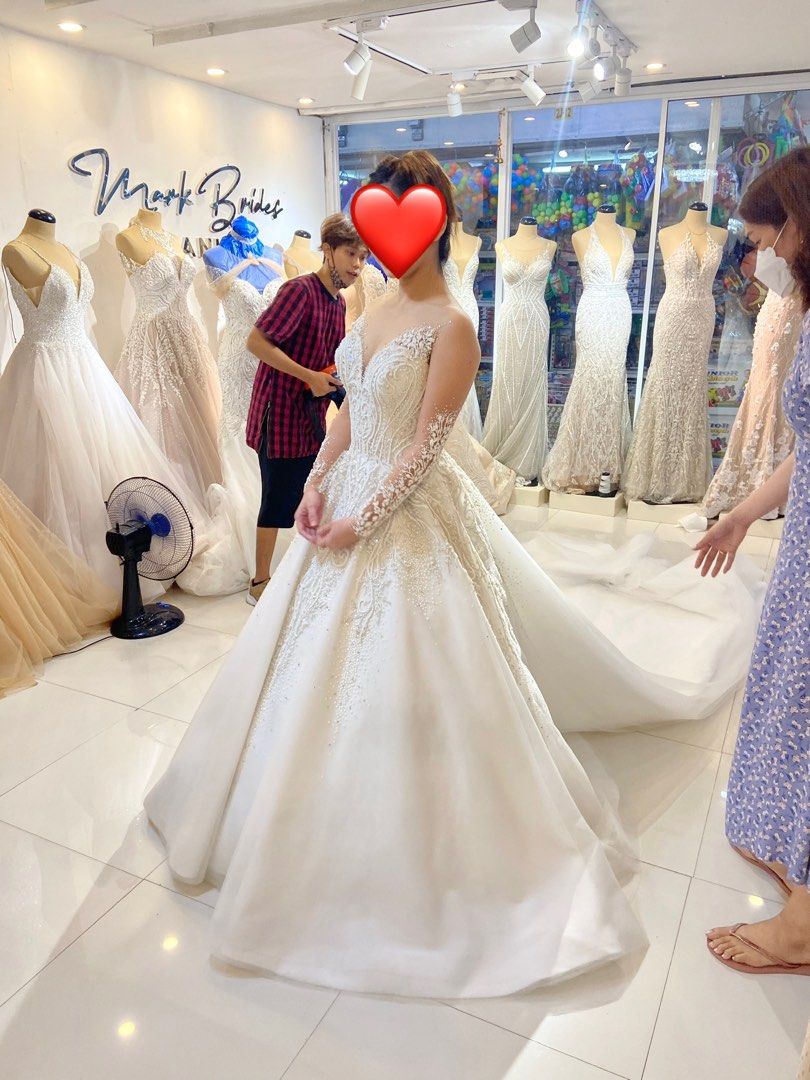 Wedding Gown Mark Brides (Category: Evening dresses & gowns) located in Manila. Submitted by angel1791 (Listing ID 1253862772, Image 3). Description: Bought 40k. Small but adjustable on back. With detachable ribbon at back With inclusions: Pillows, veil and cord.