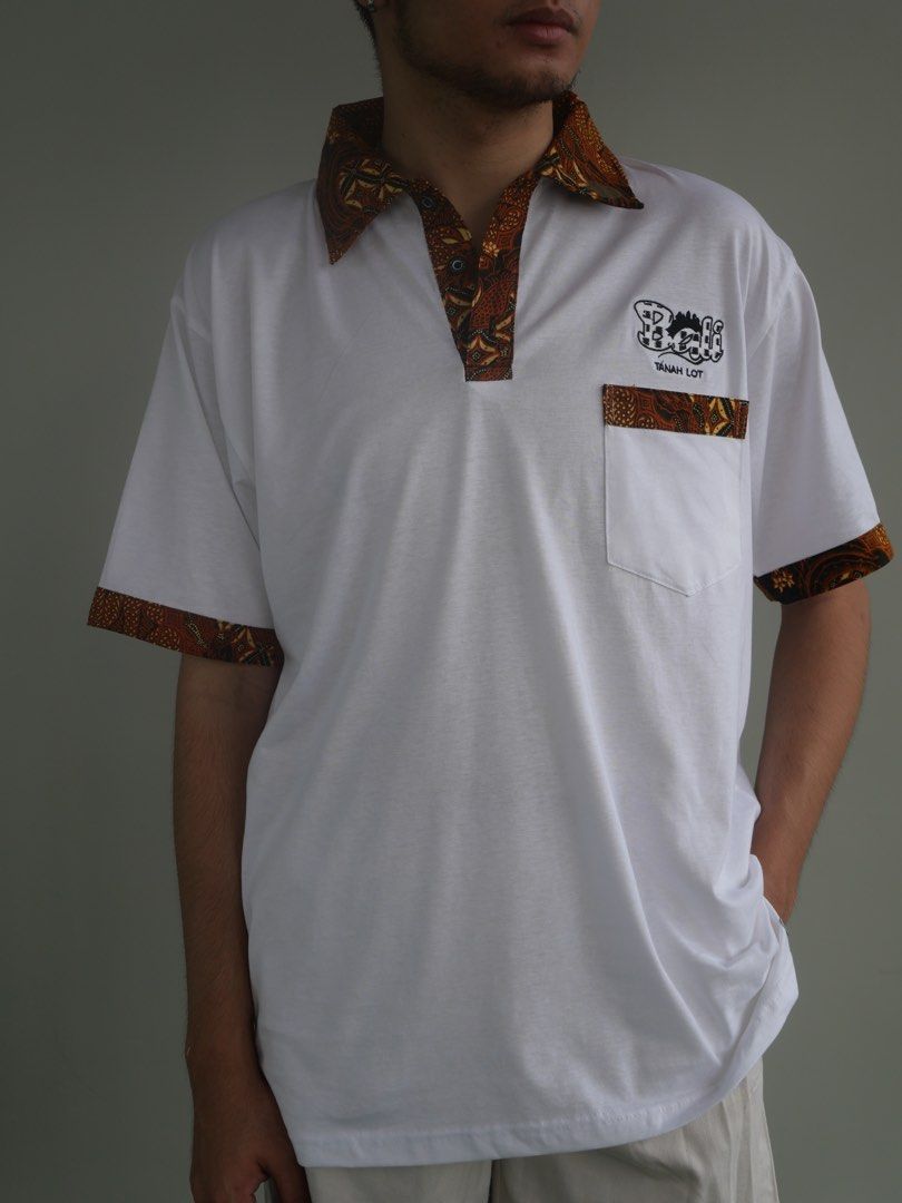white and brown polo