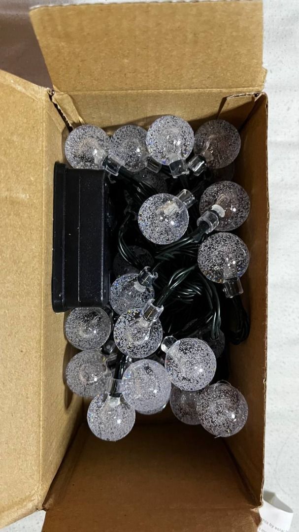 2x Solar LED String Lights Waterproof (Category: Lighting) located in Paranaque City. Submitted by mari288 (Listing ID 1275709613, Image 2). Description: 2x Solar LED String Lights Waterproof - Bought online via s app - Never used, box only opened to take pictures and check content - Package Contents: 2x User Manual, 2x Solar String Lights, 2x Solar Panel Box, 2x Pointed Stake - Length: 5 meters each RFS: Wrong item purchased ON HAND Courier: Gra