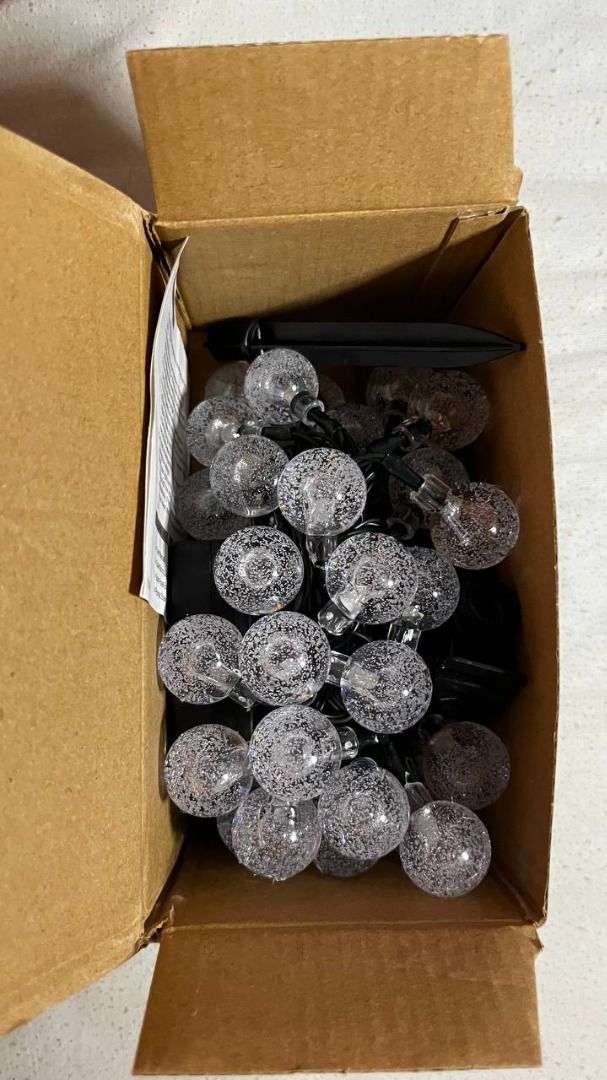 2x Solar LED String Lights Waterproof (Category: Lighting) located in Paranaque City. Submitted by mari288 (Listing ID 1275709613, Image 3). Description: 2x Solar LED String Lights Waterproof - Bought online via s app - Never used, box only opened to take pictures and check content - Package Contents: 2x User Manual, 2x Solar String Lights, 2x Solar Panel Box, 2x Pointed Stake - Length: 5 meters each RFS: Wrong item purchased ON HAND Courier: Gra
