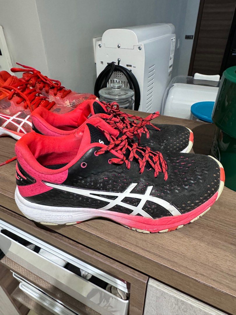 Red asics netball best sale trainers
