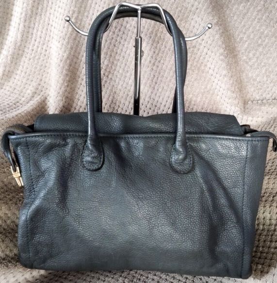 Authentic Rabeanco bag (Category: Luxury Bags & Wallets) located in Manila. Submitted by reloj (Listing ID 1275732167, Image 2). Description: Indulge in elegance with this exquisite RABEANCO gray shoulder bag. Crafted from premium Calf Skin Grained leather and accented with gold-plated hardware with minor patina consistent to it's age, this bag exudes sophistication. With three spacious compartments and a zip closure, it is perfect for organizing