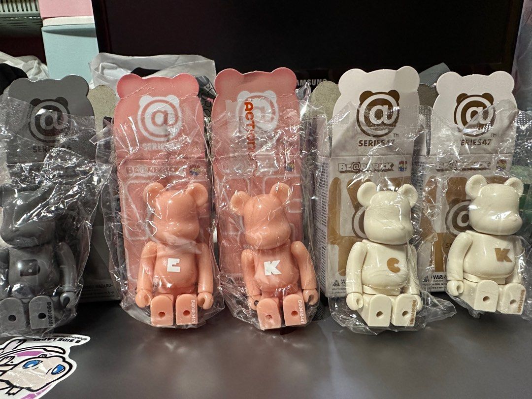 Bearbrick 100% Basic (Category: Designer & Blind Box Toys) located in Singapore. Submitted by dunkiedonkey (Listing ID 1275731729, Image 1). Description: Brand new in plastic sealed $6 each Series 45 - E, K Series 46 - B Series 47 - C, K.