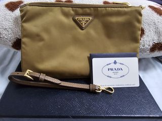Prada clutch sales bag singapore