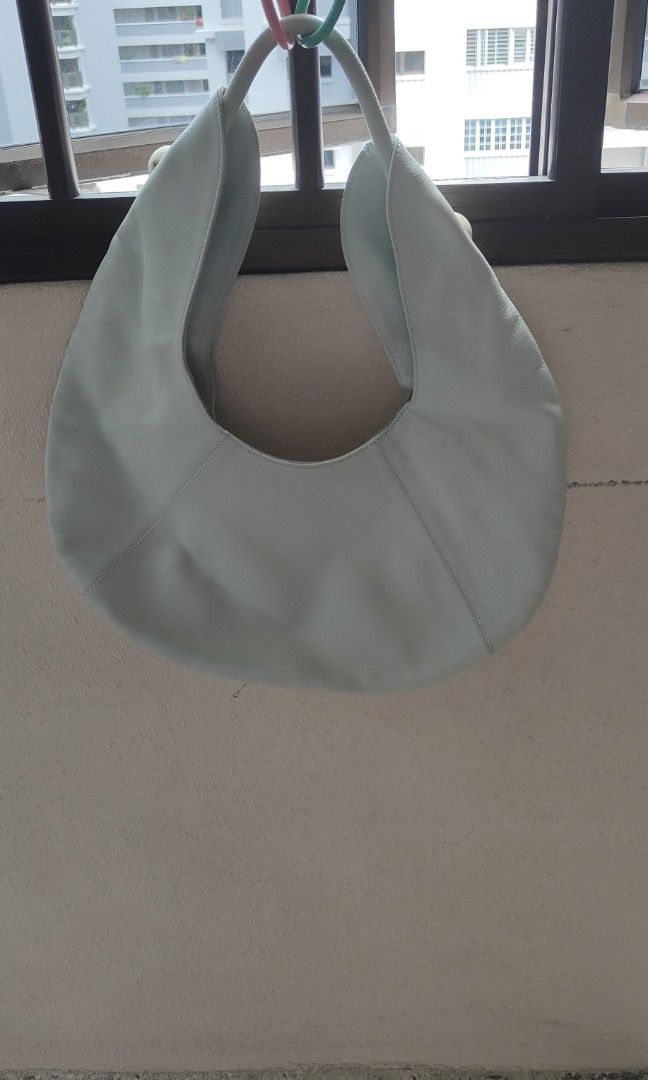 Furla oval shape shoulder carry light blue bag