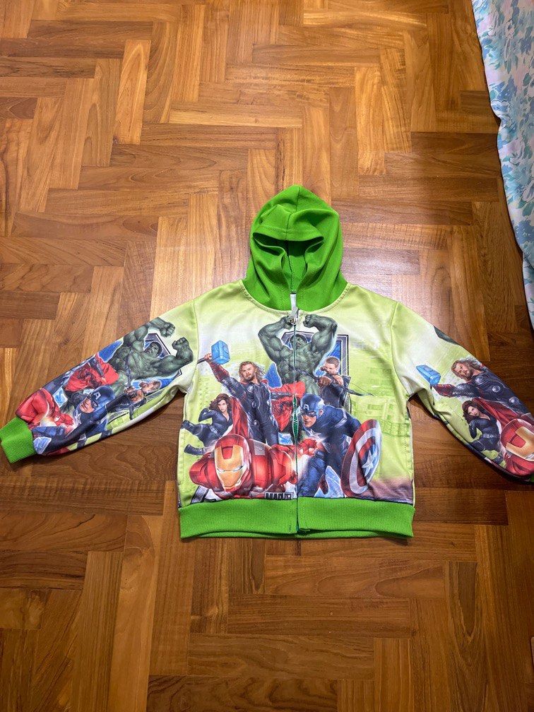 Jackets (Category: Babies & Kids Fashion) located in Singapore. Submitted by b_residence (Listing ID 1275769362, Image 6). Description: Grey Batman jacket with 2 pockets and hood - ptp 36cm, length 42cm Green avengers jacket with 2 pockets and hood - ptp 40cm, length 42cm $10 each .